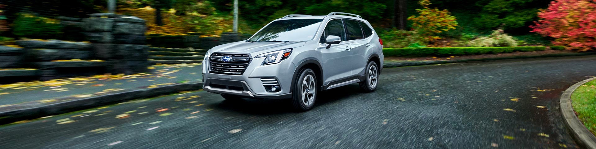 A 2022 Forester driving on a highway. | Thelen Subaru in Bay City MI