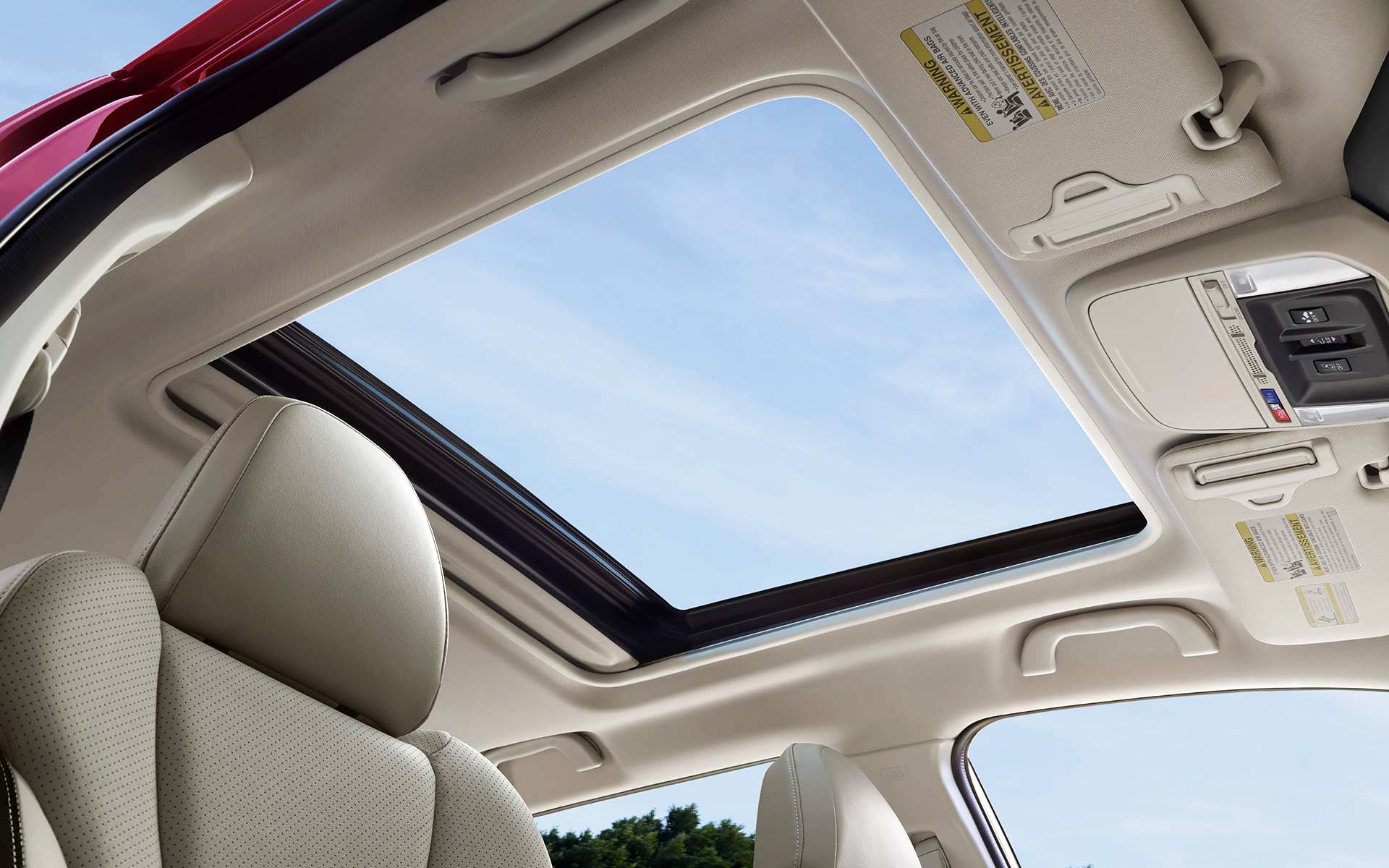 A view through the power sliding panoramic moonroof on the 2022 Forester Sport. | Thelen Subaru in Bay City MI