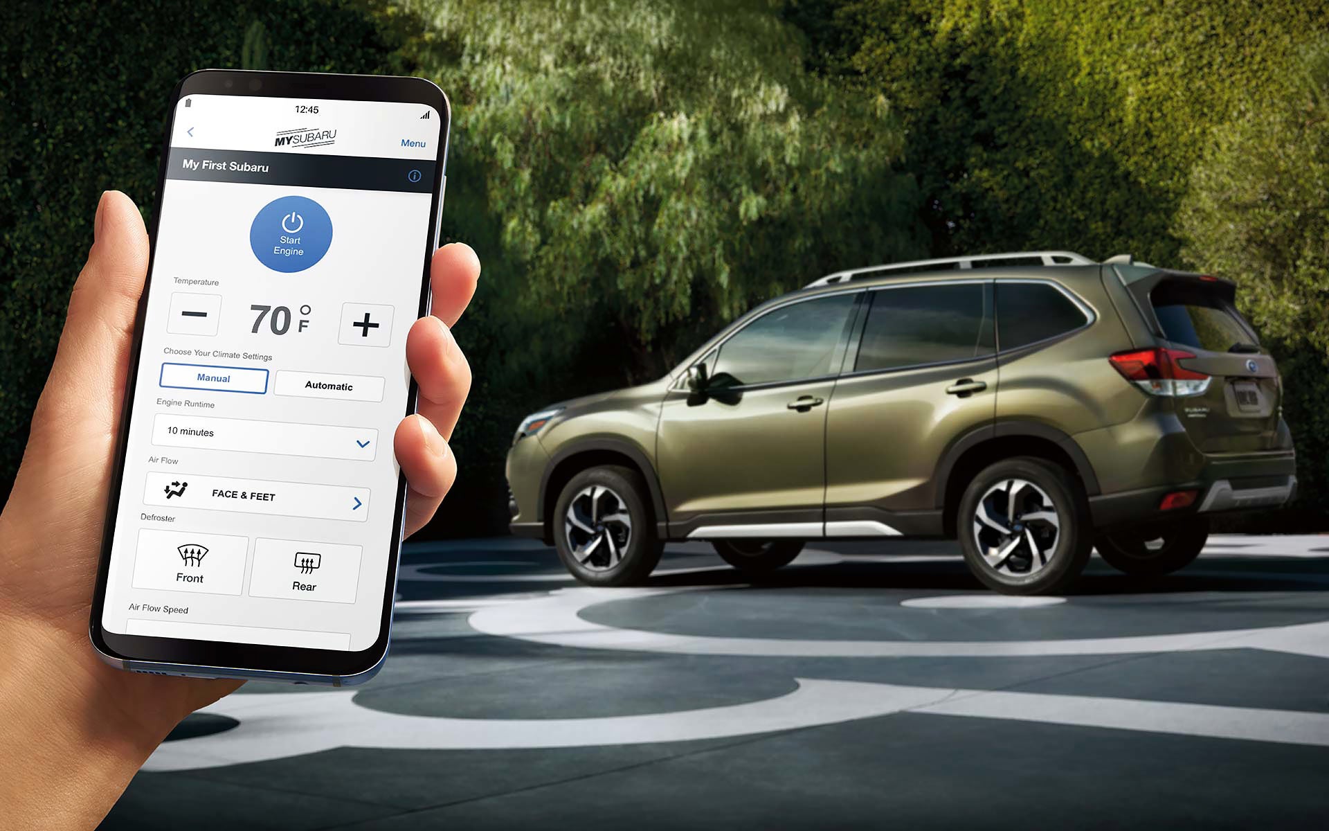 A close-up of a phone showing the Remote Engine Start with Climate Control feature of SUBARU STARLINK® Safety and Security available on the 2022 Forester. | Thelen Subaru in Bay City MI