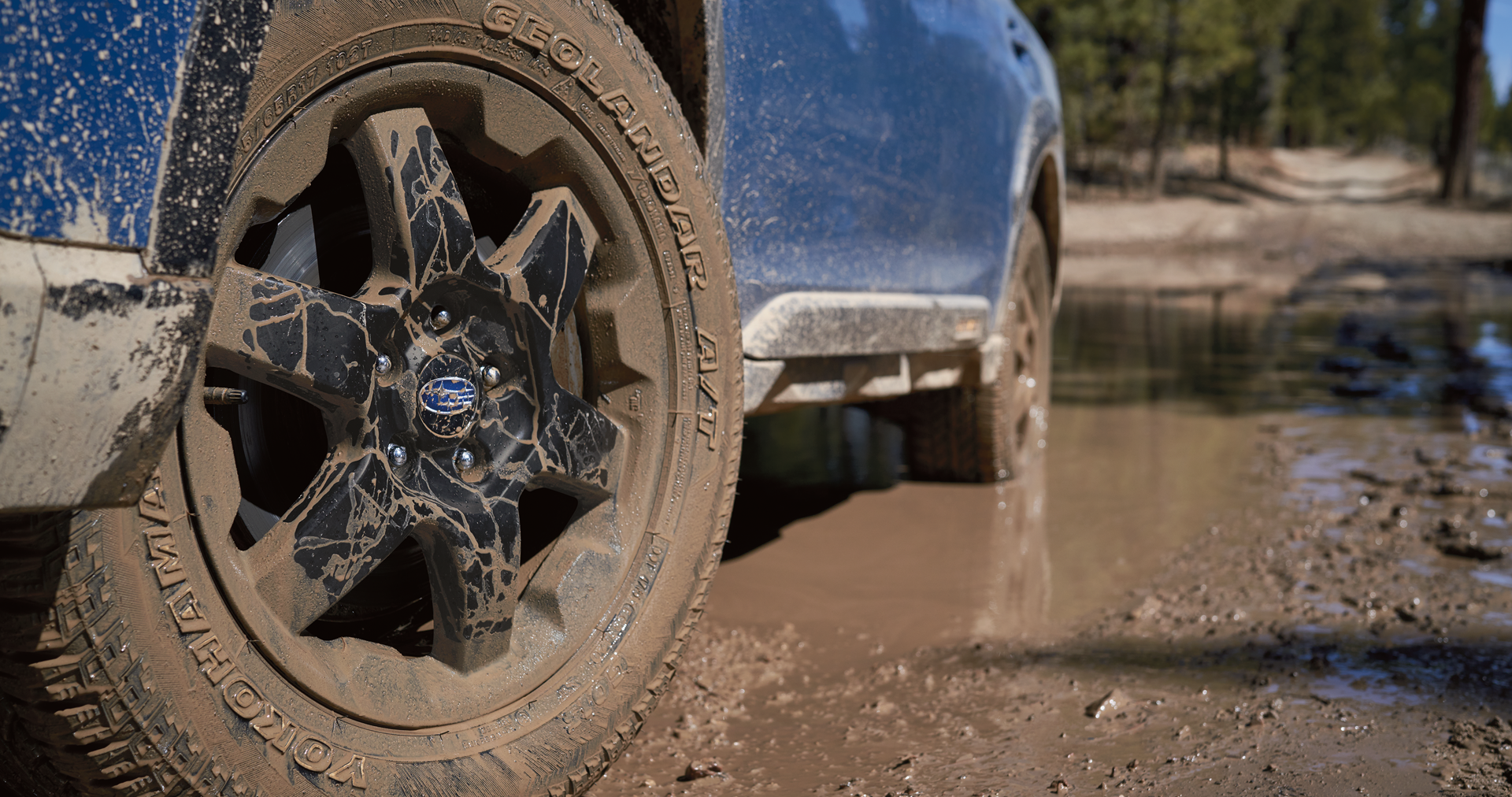 A close-up of the 17-inch off-road wheels and all-terrain Yokohama GEOLANDAR® tires on the 2023 Outback Wilderness. | Thelen Subaru in Bay City MI
