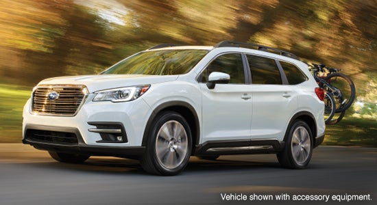 The 2022 Subaru Ascent driving on a road